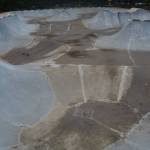 The skateboard park includes hills and valleys.