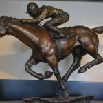 A jockey rides a horse in a race.