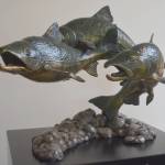 Three chum salmon are a part of this piece.