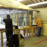Participants keep their distance at the pistol range.