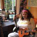 BHS band student Madison Grandt holds up her instruments while learning from home. Courtesy photo