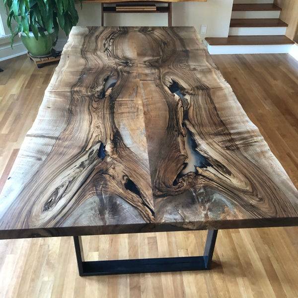 A beautiful English walnut dining table.