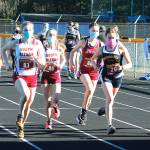 The first wave of South Kitsap and Bainbridge runners take off from the starting line. (Mark Krulish/Kitsap News Group)