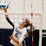 Bainbridges Isabelle Prentice collects a kill against North Kitsap. (Mark Krulish/Kitsap News Group)