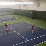 Members play doubles while wearing masks at the Bainbridge Athletic Club. Tyler Shuey/Bainbridge Island Review photos