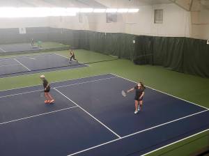 Members play doubles while wearing masks at the Bainbridge Athletic Club. Tyler Shuey/Bainbridge Island Review photos