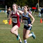 South Kitsaps Evelyn Collins-Winn (left) and Bainbridges Lily Curtis take off from the starting line at the Olympic League varsity championships at Battle Point Park. (Mark Krulish/Kitsap News Group)