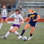 North Kitsaps Sydnee Hogan and Bainbridges Chloe Boeker (4) spar for a loose ball. (Mark Krulish/Kitsap News Group)