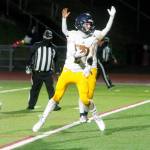 Bainbridge running back Jack Mielke spins his way into the end zone in the Spartans 28-14 win over South Kitsap on Friday night. (Mark Krulish/Kitsap News Group)