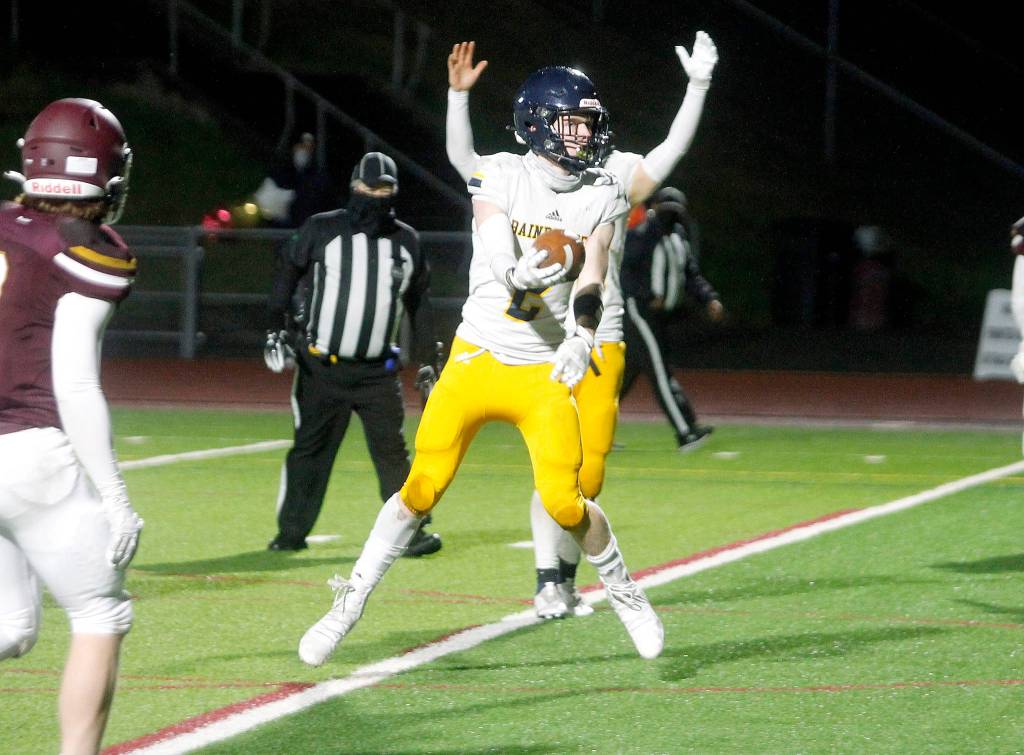 Bainbridge running back Jack Mielke spins his way into the end zone in the Spartans 28-14 win over South Kitsap on Friday night. (Mark Krulish/Kitsap News Group)