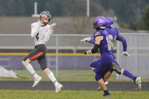 Chandler Lindstrom catches a 63-yard touchdown for Central Kitsap against Sequim. (Michael Dashiell/Sequim Gazette)