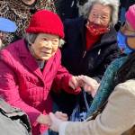 Bryan Sakuma, Toshiko Yukawa Sunohara, Lillian Sakuma Aoyama and Lucy Sunohara Richter visit with each other at the ceremony. Douglas Crist/Courtesy photo