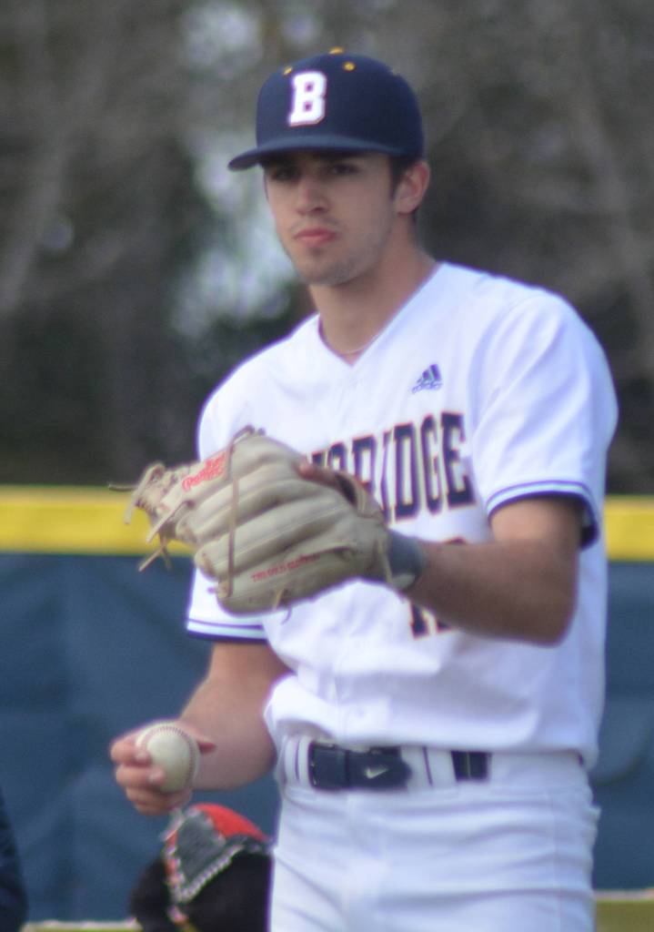 Jasiah George warms up in the bullpen.