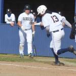 Jasiah George is tagged out by the catcher.