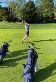 The Spartans No. 1 player Anna Kozlosky follows through on a swing on the fairway. Courtesy Photos