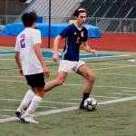 Sam Kuznetsov looks to get the ball upfield. (Mark Krulish/Kitsap News Group)