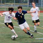 Alexander Taylor looks to race around the Sequim defense. (Mark Krulish/Kitsap News Group)