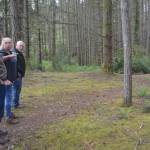 Hamlin, Janow and Lande look at a cleared area that already has trails.