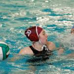 Jenna Hoisington tries to get some space to make a pass as Bainbridges Maja Carroll approaches. (Mark Krulish/Kitsap News Group)