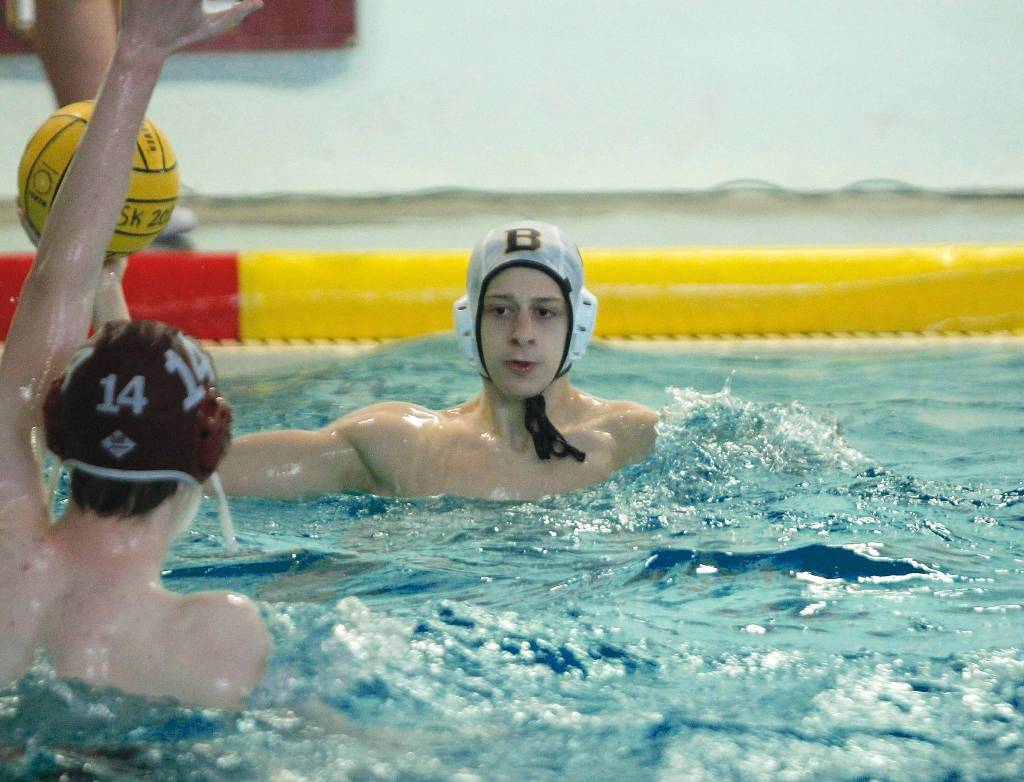 Jason Nordgren gets set to send the ball over to a teammate against South Kitsap. (Mark Krulish/Kitsap News Group)