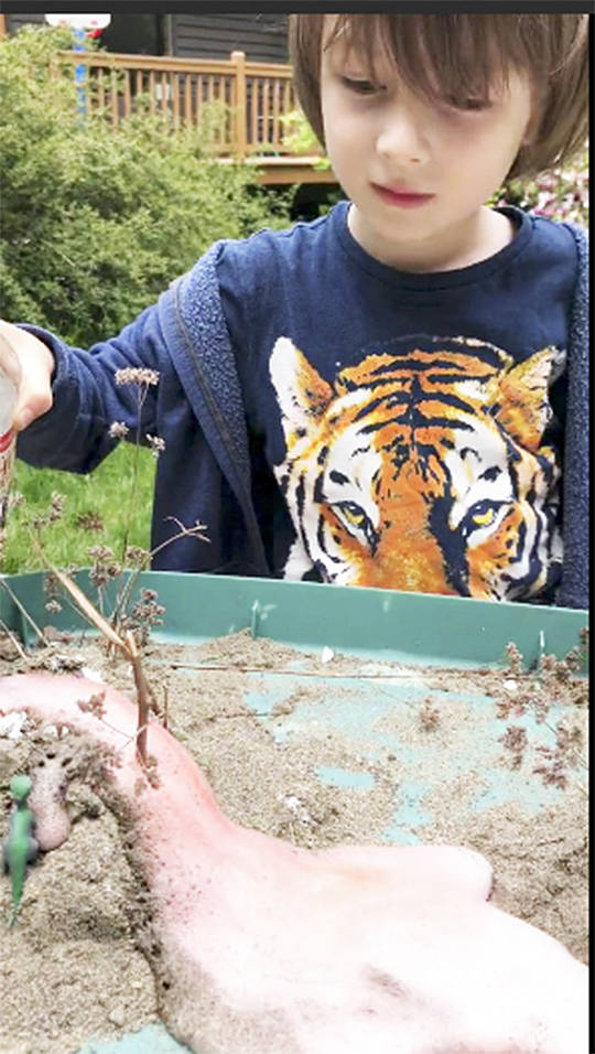 The experiment done by Rhys had to do with a volcano.