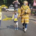 Participants in the annual Scotch Broom parade walk by the Senior Center last week. Tyler Shuey/Bainbridge Island Review photos