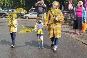 Participants in the annual Scotch Broom parade walk by the Senior Center last week. Tyler Shuey/Bainbridge Island Review photos