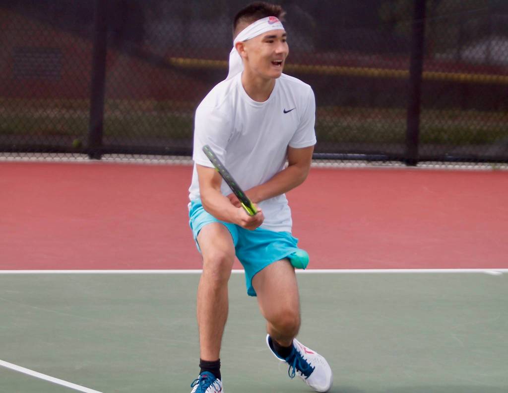Sean Westerhout of Bainbridge reacts to a successful shot. (Mark Krulish/Kitsap News Group)