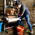 Michael Chick and a cider press. Courtesy Photos