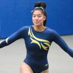 Bainbridge senior Kati Cooper runs through her floor routine. (Mark Krulish/Kitsap News Group)