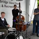 David Curcie, Elliot Mateson and Nick Lofgren played music at the event.