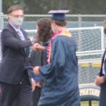 Superintendent Peter Bang-Knudsen was giving out elbow bumps to all the graduates to comply with COVID protocols. Tyler Shuey/Bainbridge Island Review