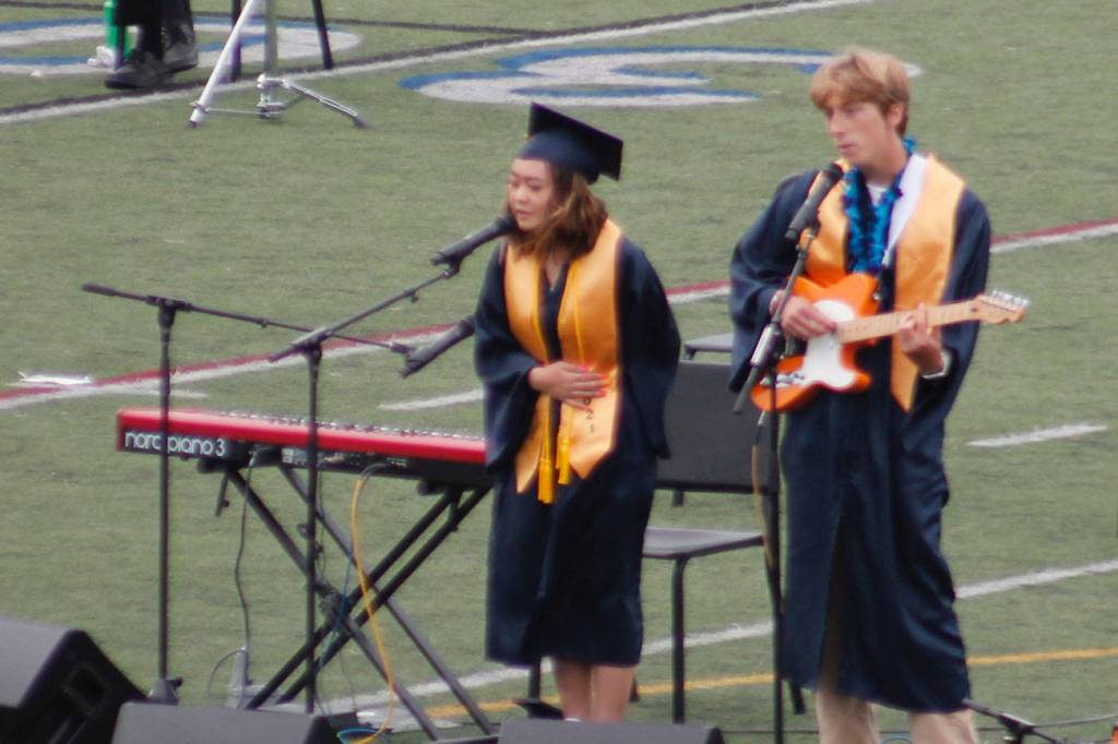Seniors Carmen Shelton-Jenck and Declan McLennan performed a song they wrote called "Moonlight" at Saturday's graduation for Bainbridge and Eagle Harbor high schools. Tyler Shuey/Bainbridge Island Review