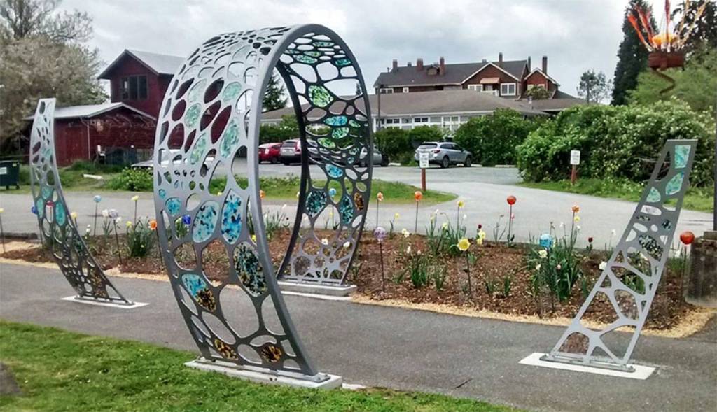 Glass artist Lin McJunkin made the glass pieces on this sculpture called "Inferred" while White did the metalwork. Courtesy photo