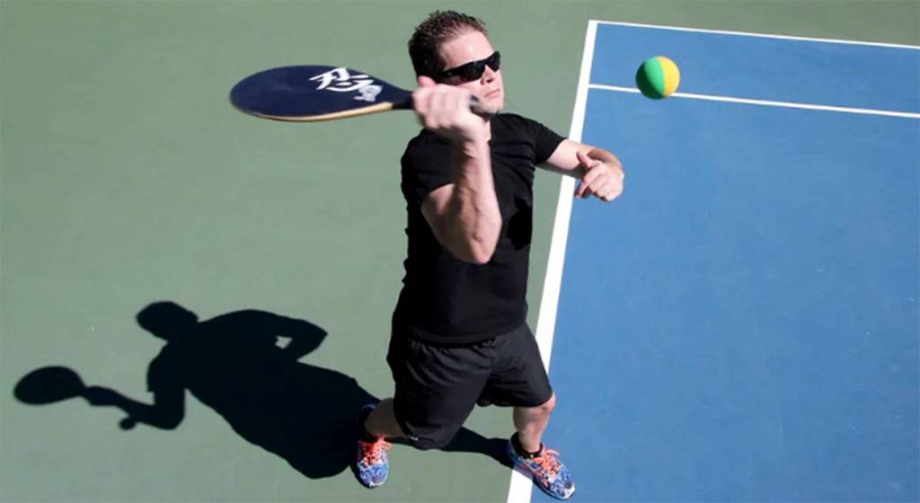 Jordan serves. Courtesy Photo