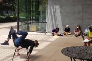 Instructor Lin Lucas acts as a model for his students to sketch as part of BIMAs Comics: Words & Pictures summer camp. Tyler Shuey/Bainbridge Island Review