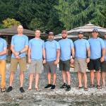The group of eight who took on the first Bainbridge 50K Warrior Paddle. From left to right: Jimmy Lee Burruss, US Navy & Coast Guard pilot from Spokane; Matt Kress, a USMC Logistics Officer from Bainbridge; Matt Sivright, USMC Infantry from Seattle; Eric Longo, USMC Infantry, from Silverdale; Dan Dinsmore, USMC Motor Transportation, from Bainbridge; Chad Rounds, USMC Harrier Pilot, FBI, from Camas; Ryan Hough, USMC Harrier Pilot, from Bainbridge; and Matt McLaughlin, USMC Harrier Pilot, from Hood River. (Contributed photo)