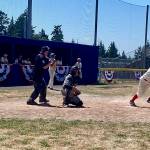 Ben Kussie digs out of the box for the Reds in the 18th annual old-timers and alumni Stars and Strikes game as MacKenzie Bond waits on deck. Bond tripled home Kussie in the bottom of the seventh to tie the game and send it to extra innings. (Photo courtesy Paimon Jaberi)