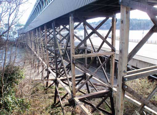 The old walkway made of wood would not hold up in an earthquake.