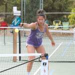 Janelle Chow of Redmond returns serve in the 3.0, 8-49 gold medal match, which she won with partner Josh Bond, also of Redmond. Chow also won a silver medal in a womens double tournament. (Mark Krulish/Kitsap News Group)