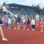 Steve Powell | Bainbridge Island Review
Above: Cheerleaders just start learning their routine for the halftime show. Right: Early on all of the campers got this part of the routine down.