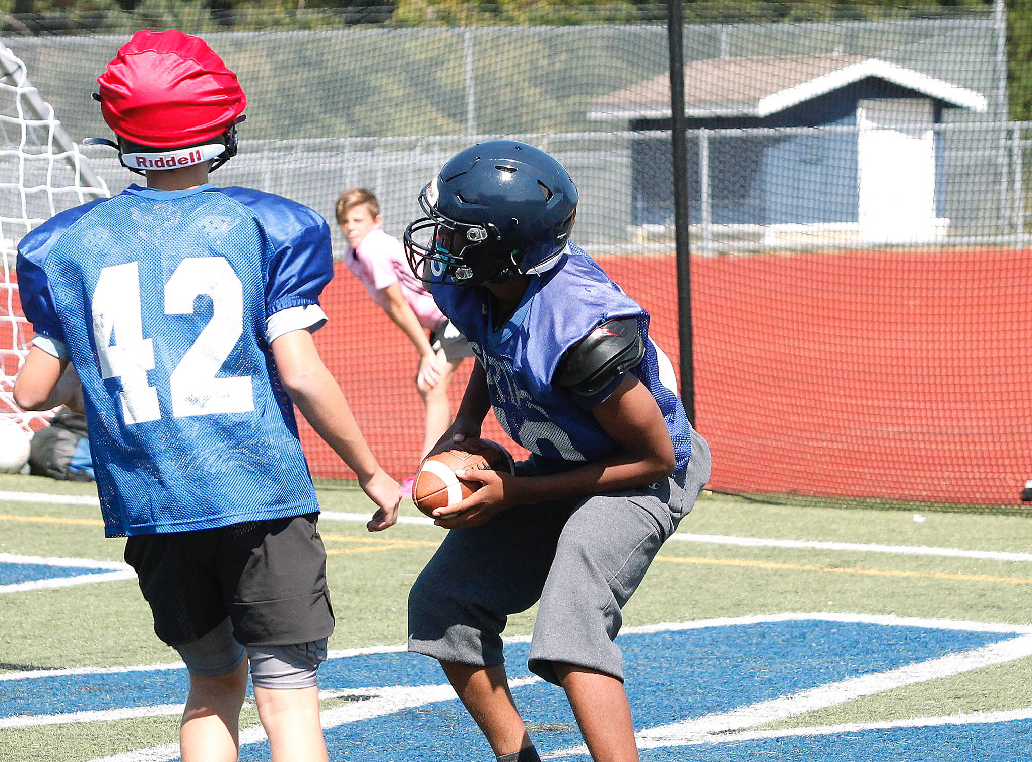 Micah Bryant comes down with an interception for Bainbridges defensive squad. (Mark Krulish/Kitsap News Group)