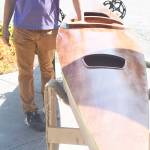 .
Photos by Steve Powell | Bainbridge Island Review
Max Taylor with the kayak he is building.