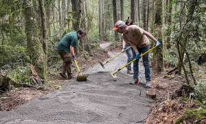 Crew workers finish off the trail. Courtesy Photo