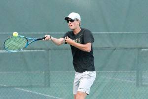 Josh Smith, along with partner Drake Jones, are the top doubles pair for North Kitsap and led the way in Thursdays match against Bainbridge, winning 6-0, 6-1. (Mark Krulish/Kitsap News Group)