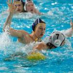 Finn Miller plays defense against his Mercer Island counterpart, Finn Friedland (7), in Monday nights water polo match agains the Islanders. Bainbridge won 17-8. (Mark Krulish/Kitsap News Group)
