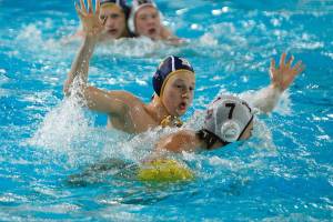 Finn Miller plays defense against his Mercer Island counterpart, Finn Friedland (7), in Monday nights water polo match agains the Islanders. Bainbridge won 17-8. (Mark Krulish/Kitsap News Group)