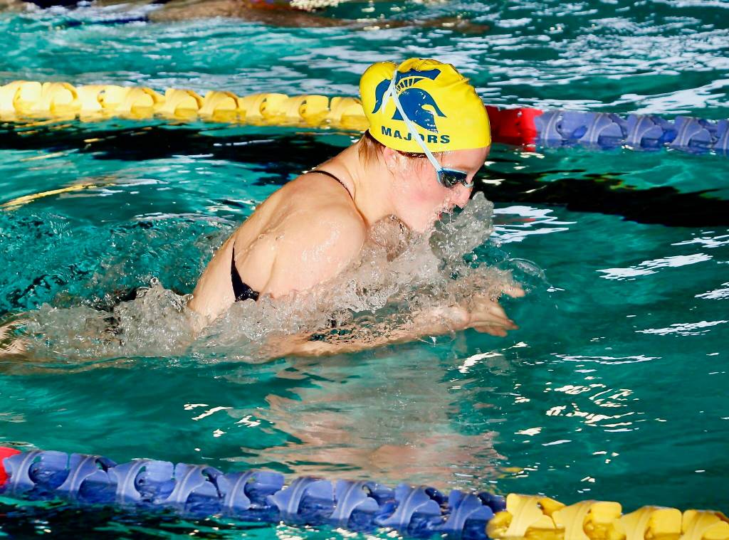 Piper Majors swims the 100-yard breaststroke against North Kitsap and Kingston. (Mark Krulish/Kitsap News Group)