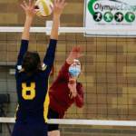 Marion Stejer slips a shot past the Bainbridge defense. She was Kingstons leading hitter on Tuesday. (Mark Krulish/Kitsap News Group)