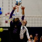 Allie Wildsmith uses every inch of her wingspan to reach up and knock a shot past a North Kitsap defender. (Mark Krulish/Kitsap News Group)